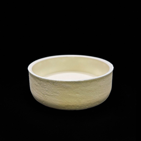 White ceramic crucible used for high-temperature laboratory and industrial processing applications.