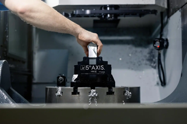 What is green machining shown through CNC machining of an unfired ceramic component before sintering for precise shaping.
